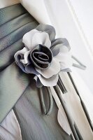 Grey and white fabric flower
