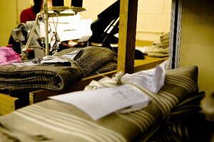 Sewing machine and cut fabric in sewing room