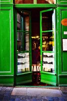 Green-painted front door of restaurant