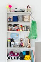 A shelf of craft materials