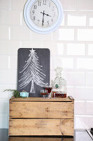 Christmas tree on chalkboard on wooden box