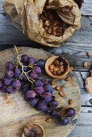 Black grapes and apricot stones