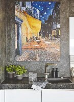 A large painting on a stone-coated wall above a sink