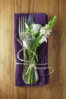 Napkin and cutlery decorated with flowers