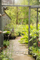 Paved path leading from nursery into garden