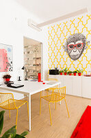Reading area in office with original wallpaper with ape motif