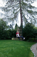 Boy sliding down zipline
