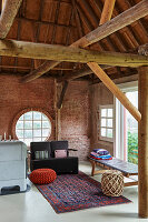 Lounge in renovated, red-brick barn