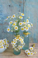 Arrangements and small wreath of chamomile flowers