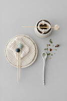 DIY tea bags with wooden skewers as holders