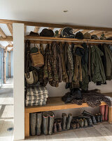 Wardrobe with coats, boots, and hats