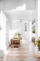 Elegant covered veranda with designer furniture