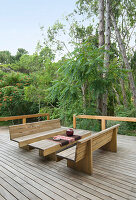 Bench seats on outdoor woodland terrace