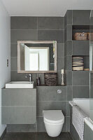 Bathroom with grey wall tiles