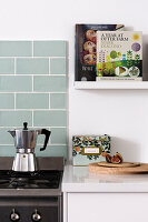 Kitchen corner with mocha pot and cookery books