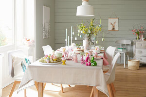 Easter table set and decorated in pastel shades
