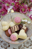 Chocolates in an antique tea cup