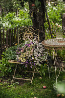 A bouquet of sea lavender on a garden chair (Limonium)