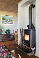 A wood-burning stove in a rural-style living room