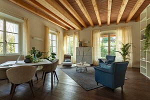 Living room with wood-beamed ceiling