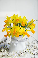 Enamel pot with daffodils