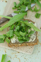 Buttered bread with ribwort