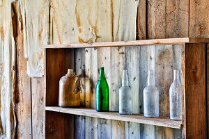 USA, Montana, Bannack State Park, Old Bottles on a Shelf