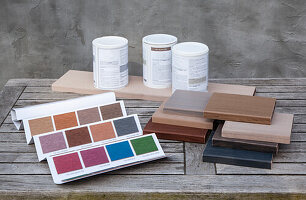 Color chart, wood samples and paint tins
