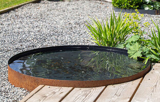 Water basin in the garden, minimalist design