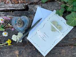 DIY seed paper in the shape of a heart made from flower seeds and egg carton