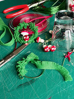 Make small felt wreaths with toadstools