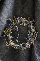 Wreath made from grapevines and sloe berries