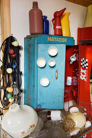 Vintage metal cabinet and used glass lampshades