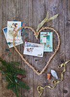 DIY Christmas decorations with cards, fir branches and hearts