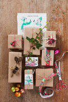 Christmas-wrapped presents with natural decorations and colourful ribbons
