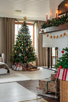 Living room decorated for Christmas with Christmas tree and presents