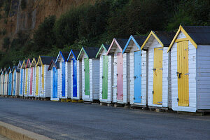 Row of colourful beach huts with colourful doors (Isle of White, England)