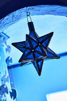 Blue star pendant made of glass and metal