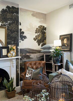 Cosy reading corner with leather armchair and vintage-look wallpaper