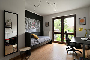 Study with desk, day bed and large window