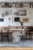 Dining area with upholstered bench seat and star lights
