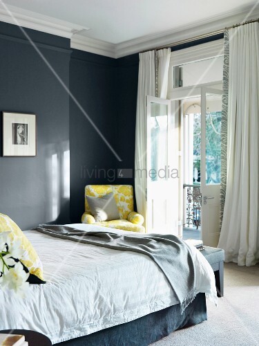 Classic Bedroom With Pale Yellow Textile Buy Image