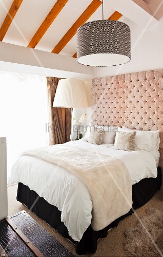 Double Bed With Upholstered Headboard And Pendant Lamp With