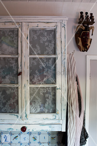 A Vintage Cabinet With Voile Curtains Buy Image 11039101
