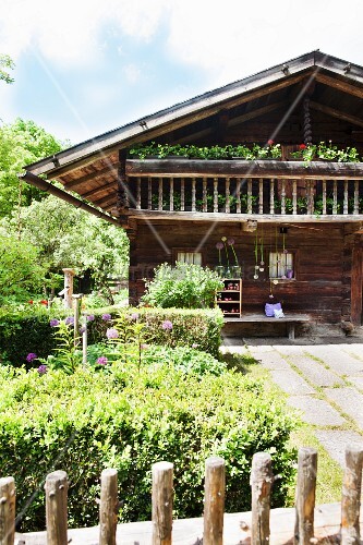 Rustic Log Cabin With Balcony And Garden Buy Image 11969047