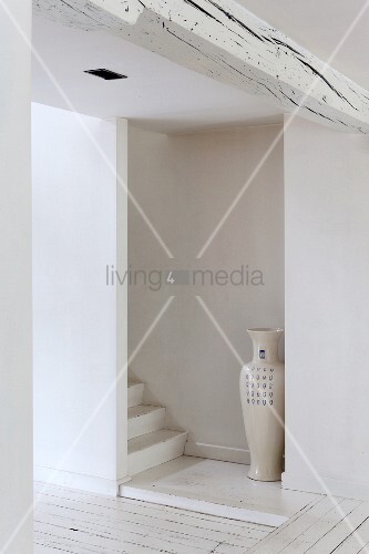 Floor Vase At Foot Of Simple White Buy Image 11988439