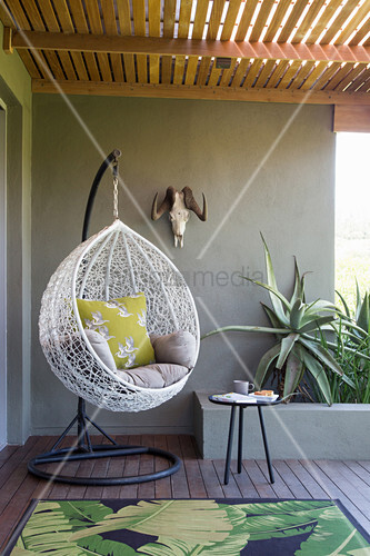 Hanging Chair On Roofed Terrace In Urban Buy Image