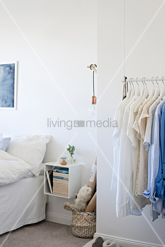 Suspended Clothes Rail In White Bedroom Buy Image 12309129