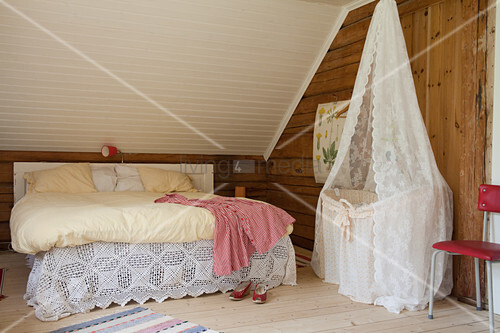 Cot Under Lace Canopy Next To Double Bed Buy Image