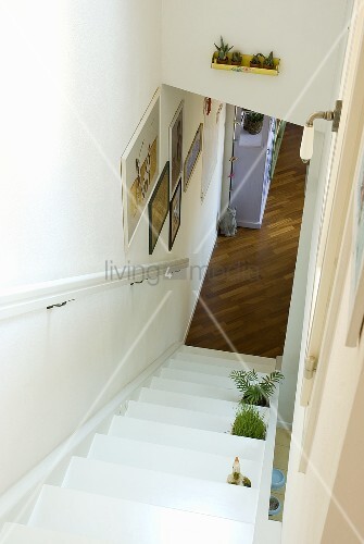 A White Wooden Staircase With A View Of Buy Image 00334889